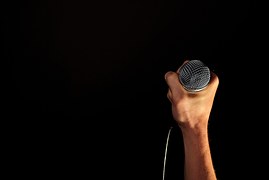 holding mic
